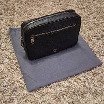 Kozna torbica Cristian Dior